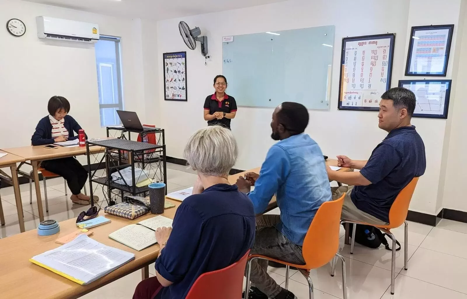 Samphors teaching an in-person Khmer class